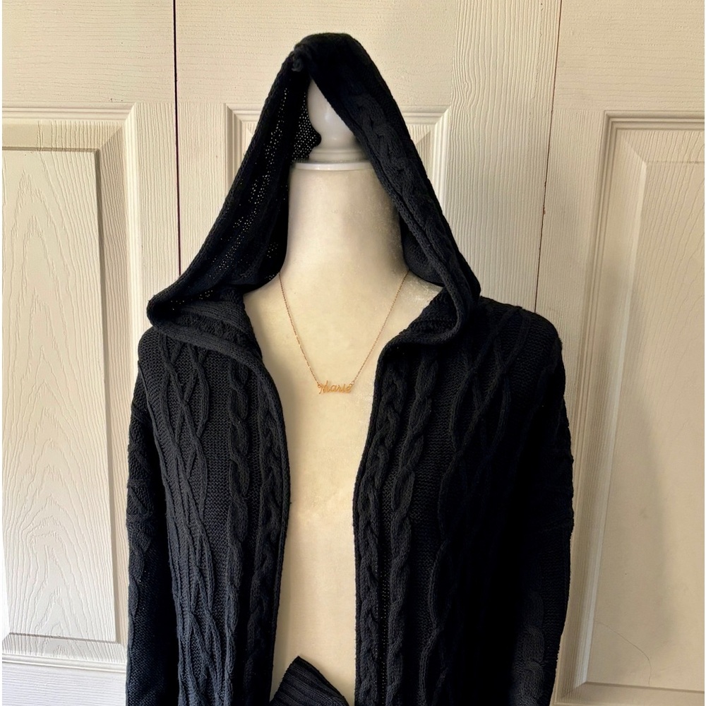 Ladies black sweater coat size medium, long sleeves with 2 front pockets